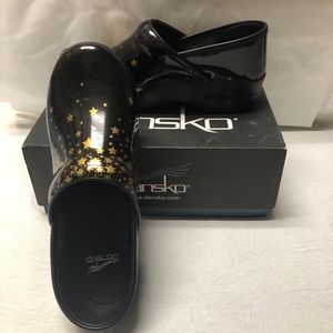 Dansko Leather black and gold stars clogs